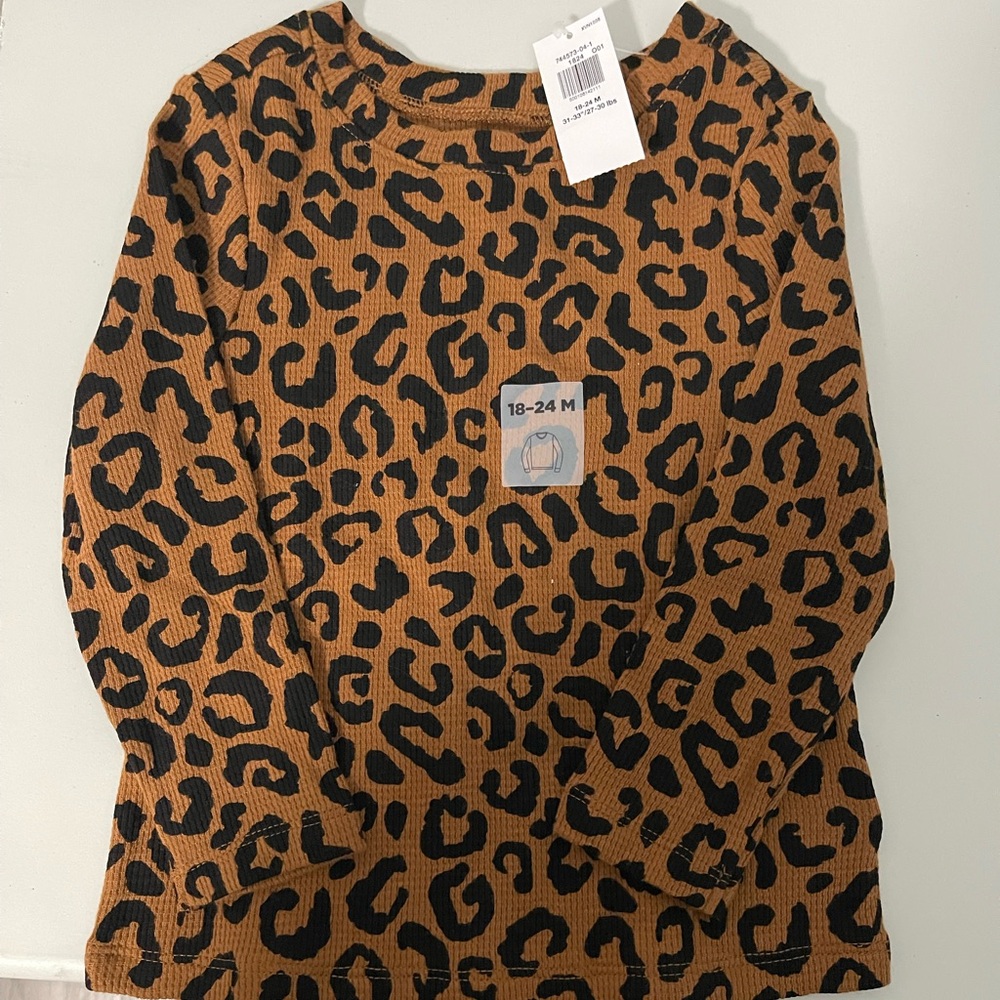 Old Navy cheetah print long sleeve 
18-24M
NEW
